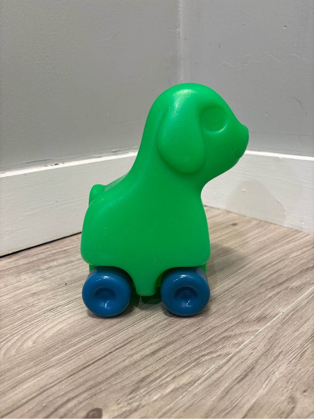 Green Pull-Along Puppy Toy with Blue Wheels - Kids Toys